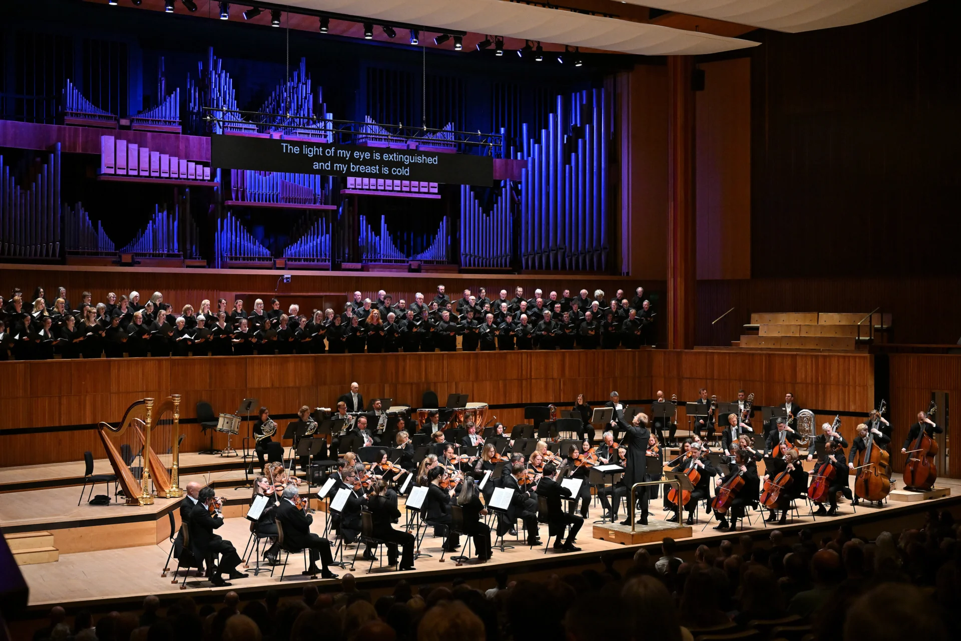 The Royal Philharmonic Orchestra and Philharmonia Chorus performing on stage