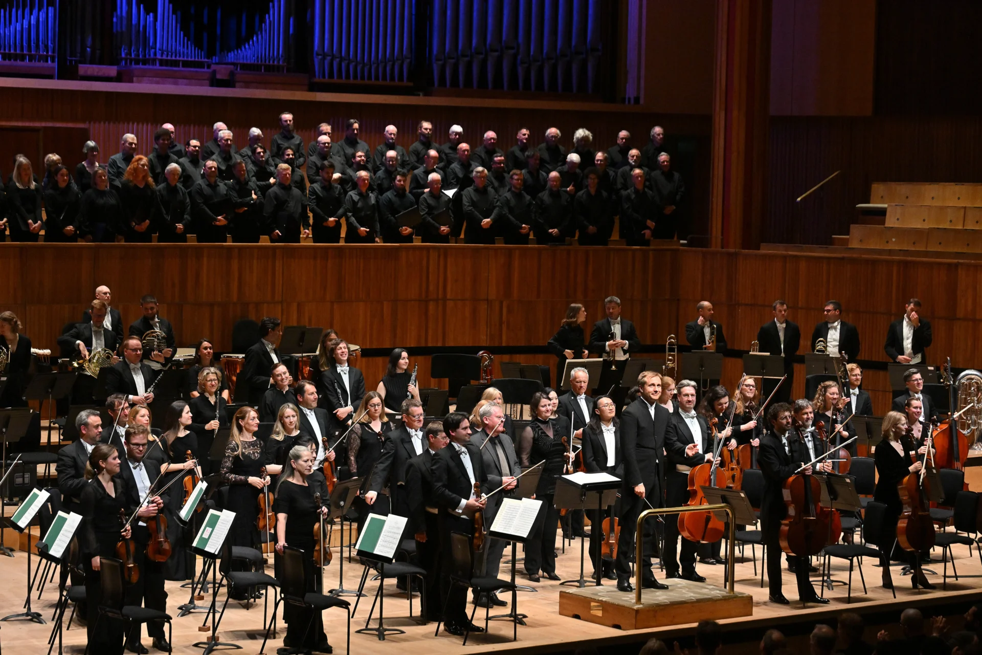 The Royal Philharmonic Orchestra, Vasily Petrenko and Philharmonia Chorus standing to receive applause