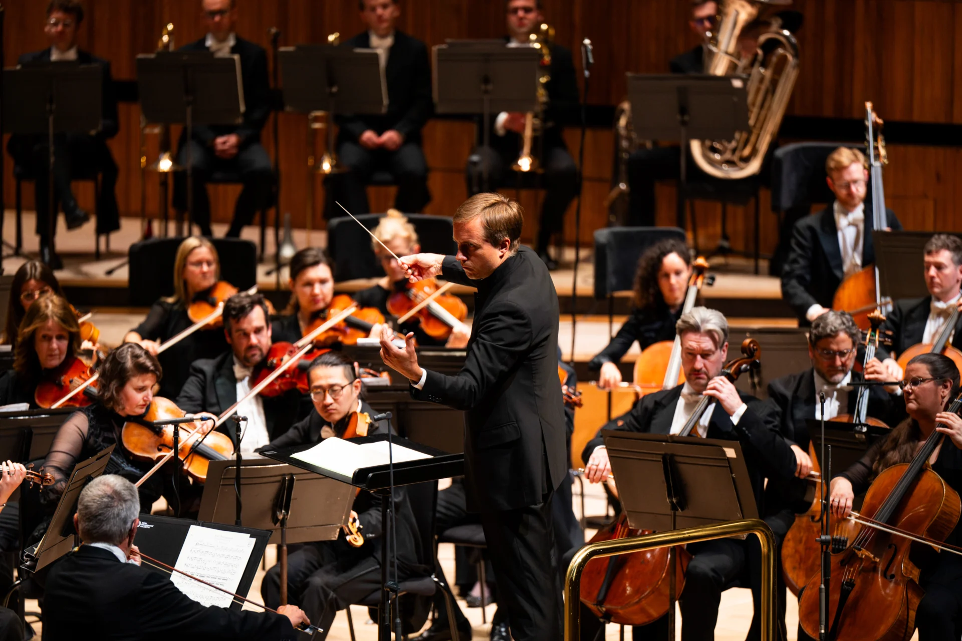 Vasily Petrenko conducting and looking at the First Violins