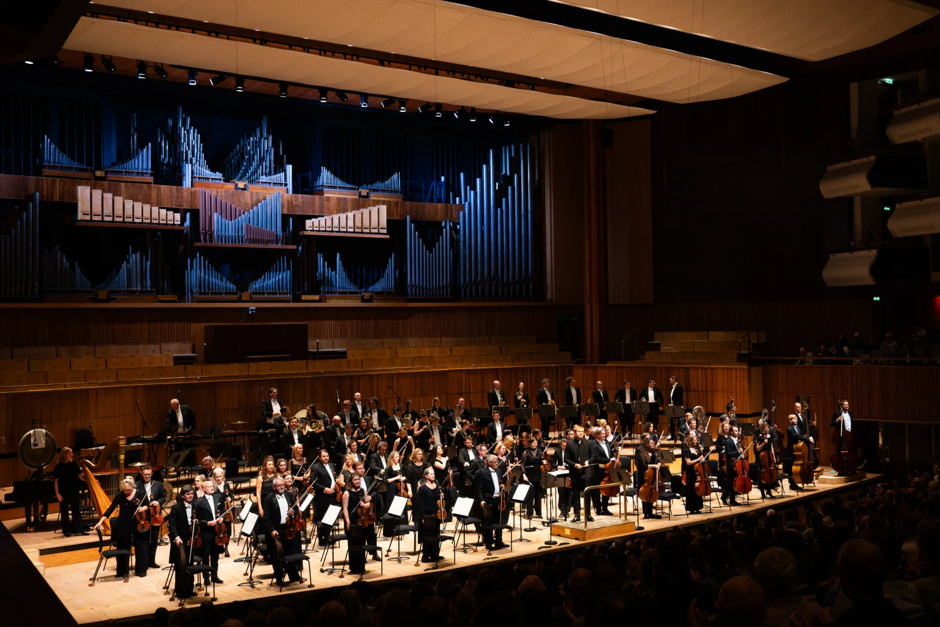 The RPO standing on stage to receive applause