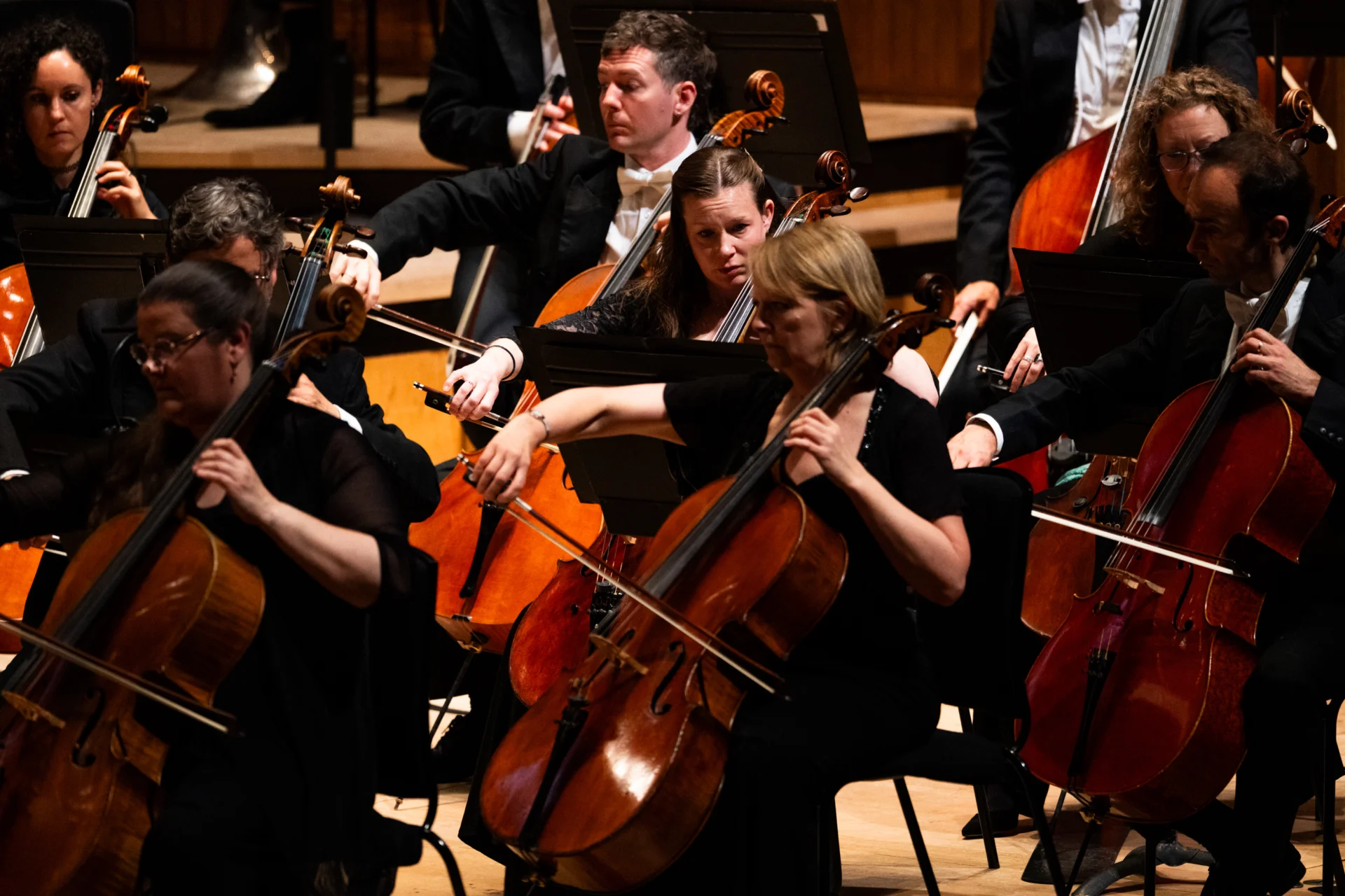 RPO cellists performing on stage