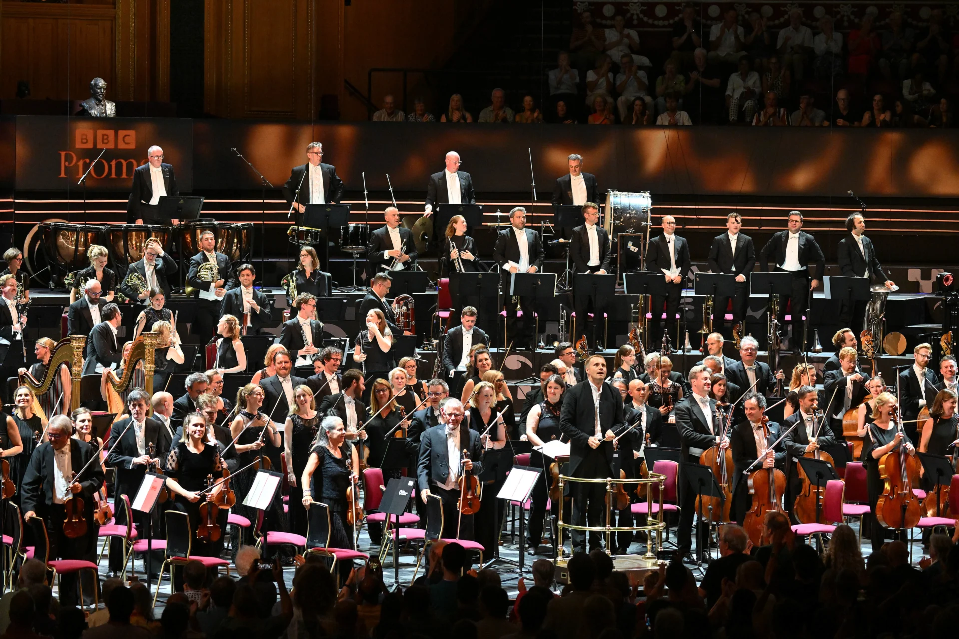 The Orchestra and Vasily Petrenko standing for applause