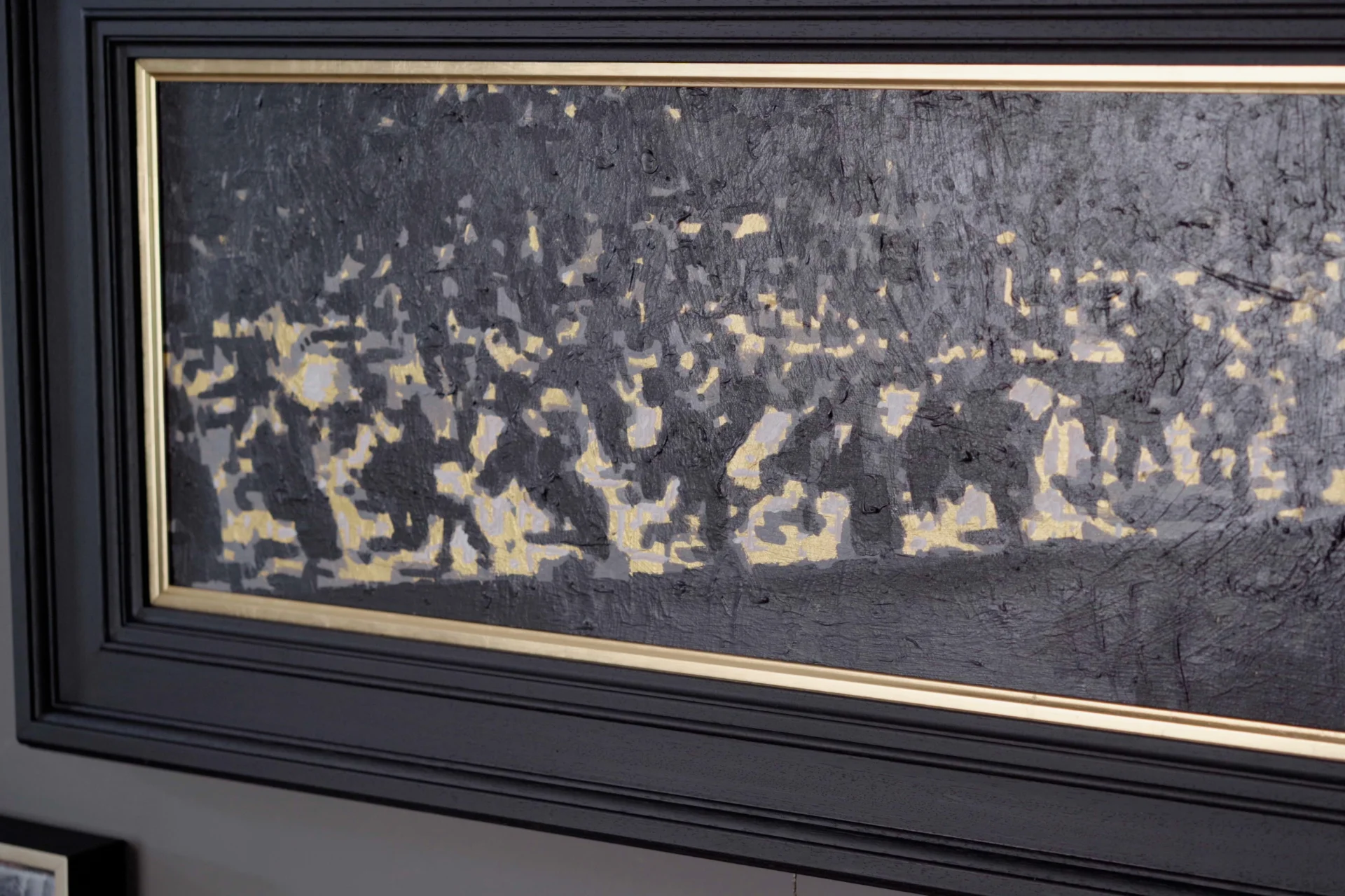 One of Jeremy's paintings of the Orchestra in a black and gold frame