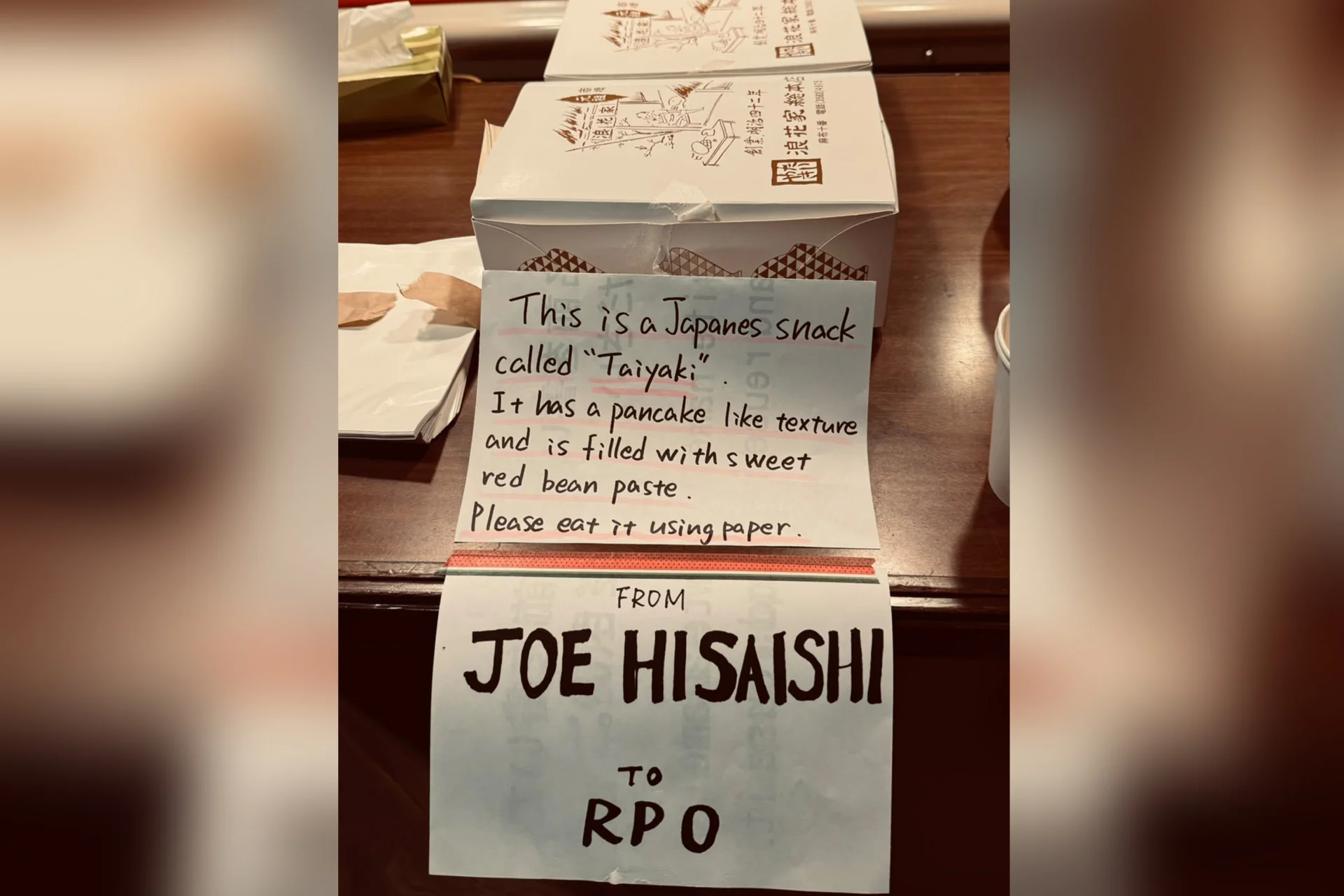 A message from Joe Hisaishi to the RPO - 'this is a Japenese snack called 'Taiyaki', it has a pacake-like texture and is filled with sweet red bean paste. Please eat it using paper'
