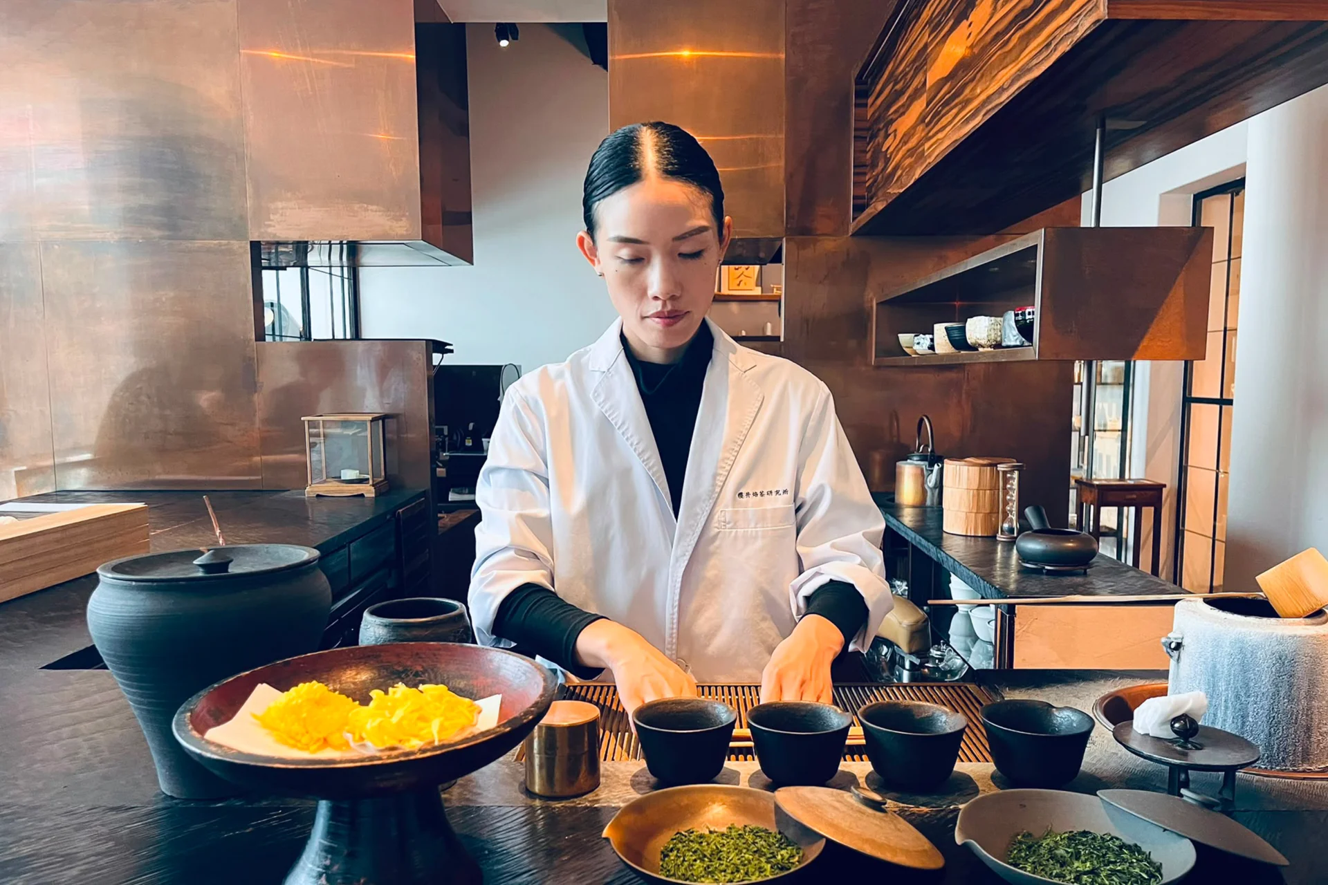 A woman preparing tea