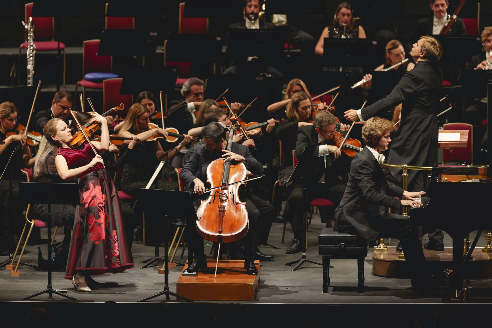 Julia Fischer, Pablo Ferrández and Jan Lisiecki performing on stage at Royal Albert Hall
