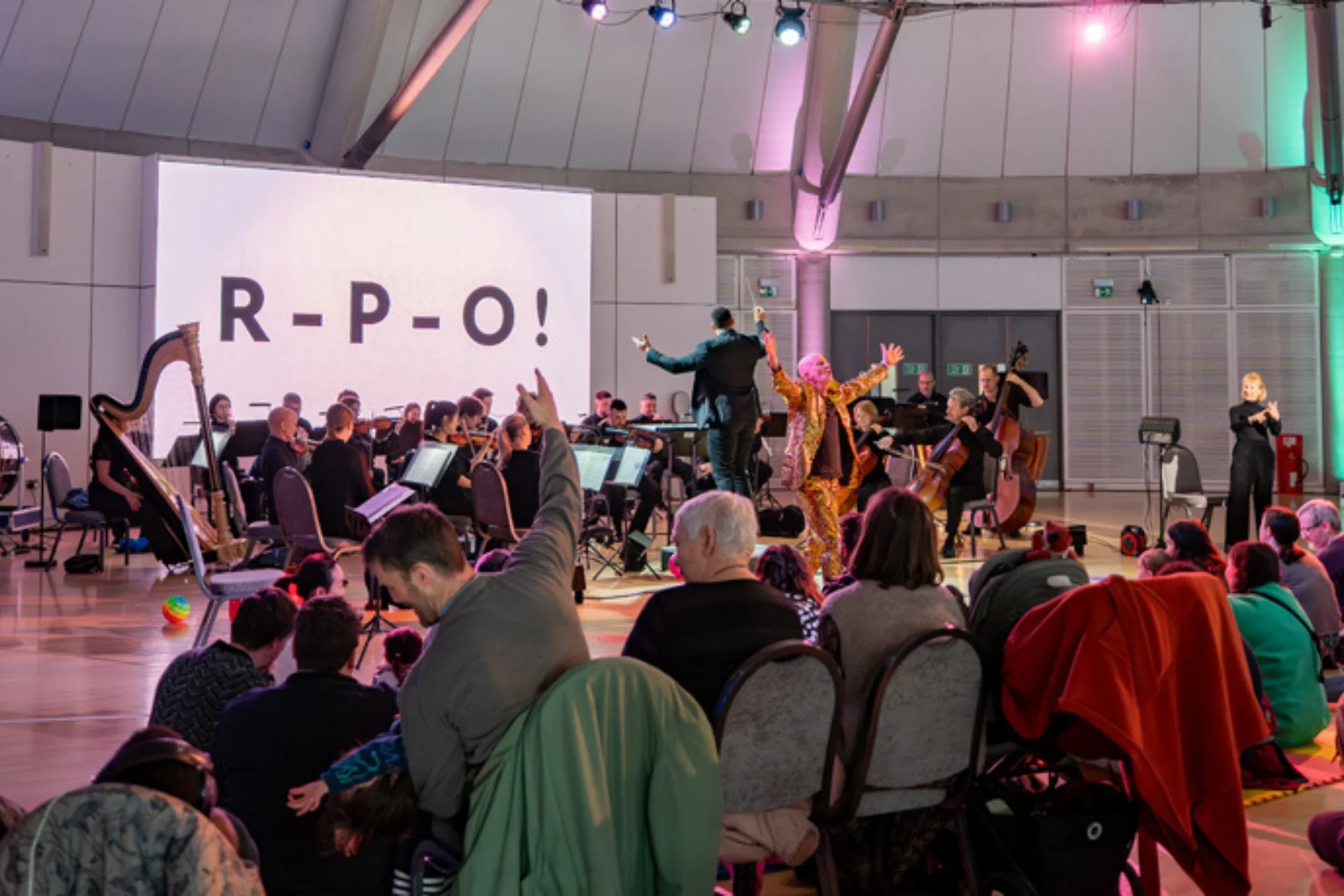 Audience in front of stage of a Relaxed Orchestra Performance