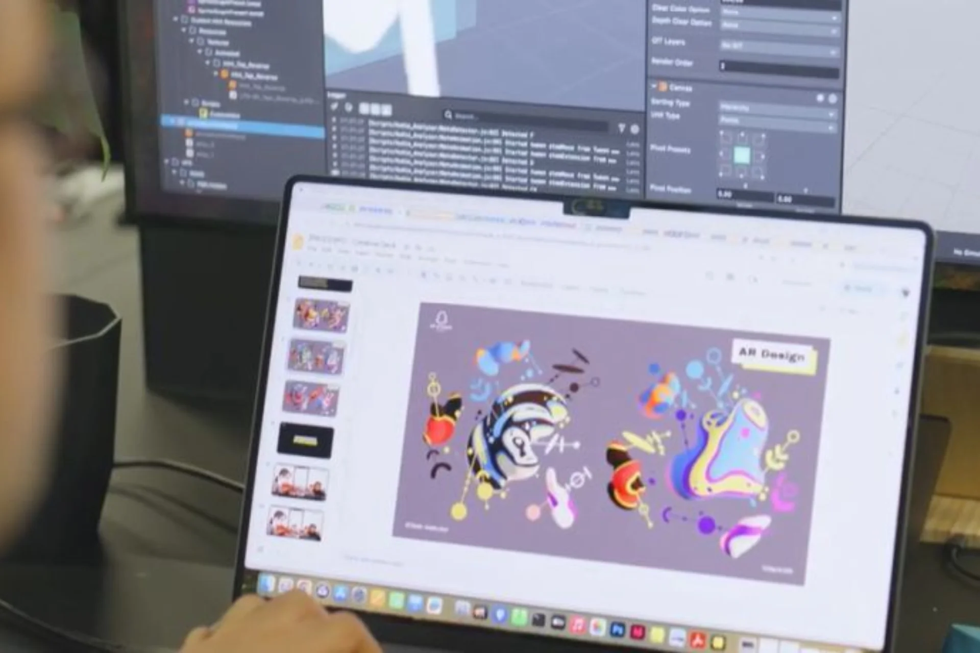 A computer screen showing the AR design for The Colours of Music can be seen