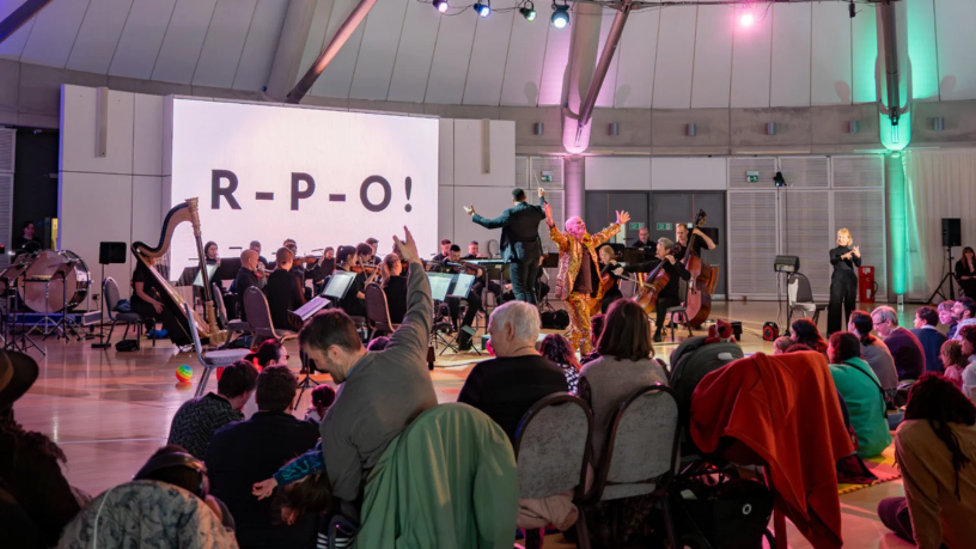 Audience in front of stage of a Relaxed Orchestra Performance