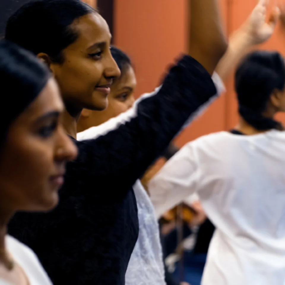 Indian Kathak dancers with Orchestra players in the background