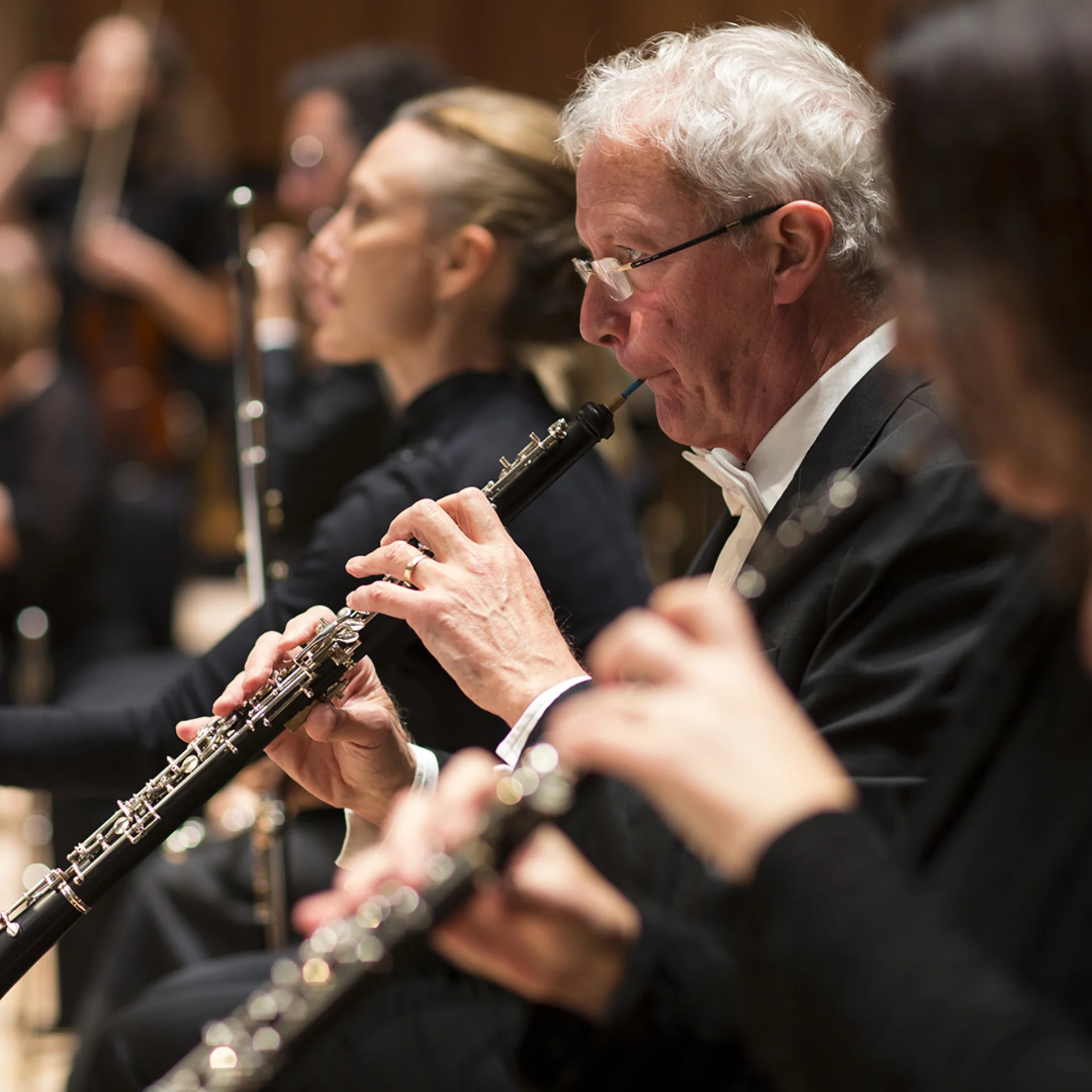 Tim Watts playing the oboe in concert
