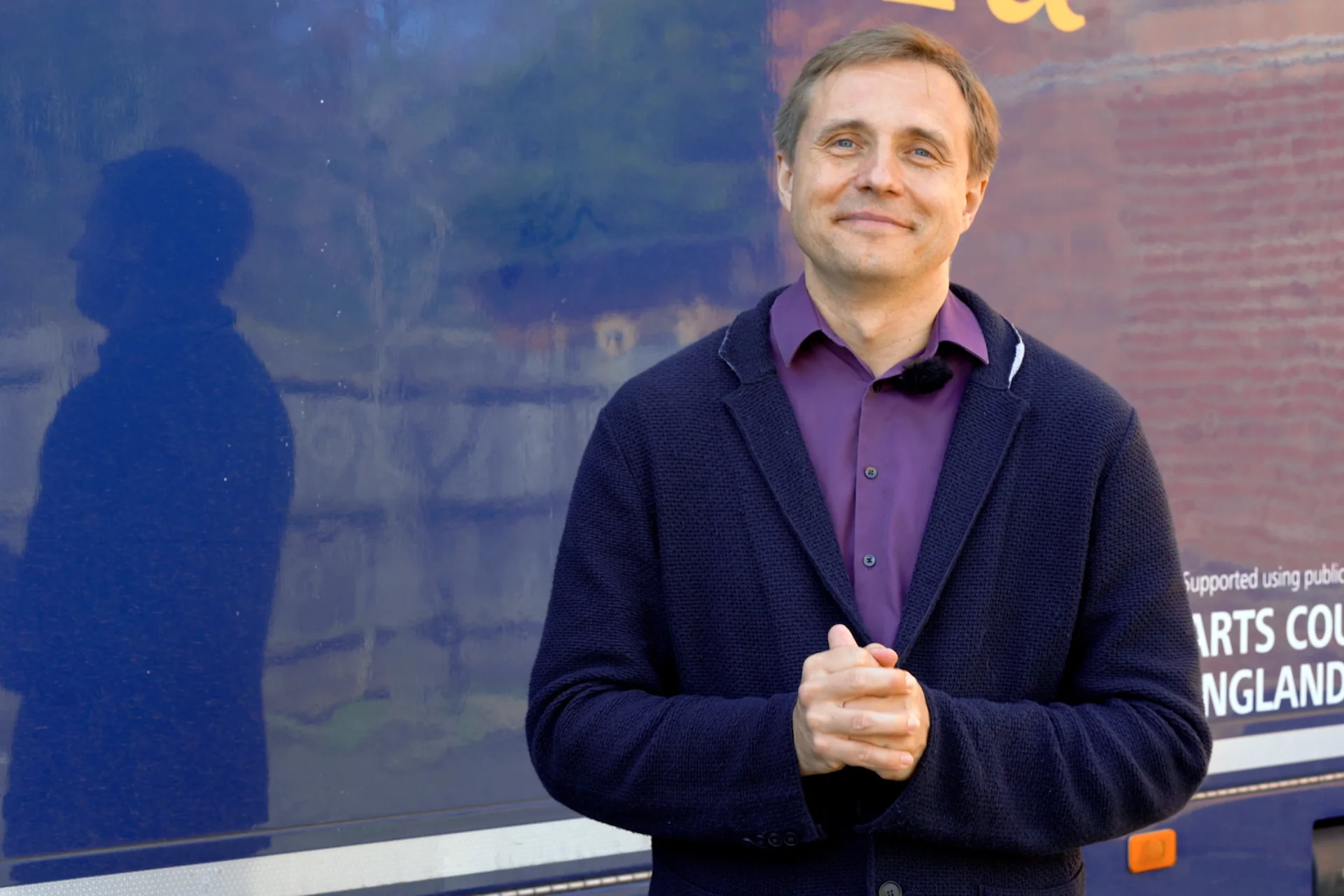 Vasily Petrenko standing in front of the RPO truck