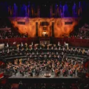 The Royal Philharmonic Orchestra performing on stage at the Royal Albert Hall