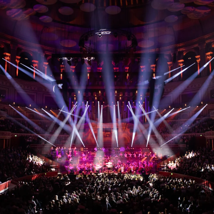 RPO on stage to sold-out audience at Royal Albert Hall with laser lighting illuminating the stage