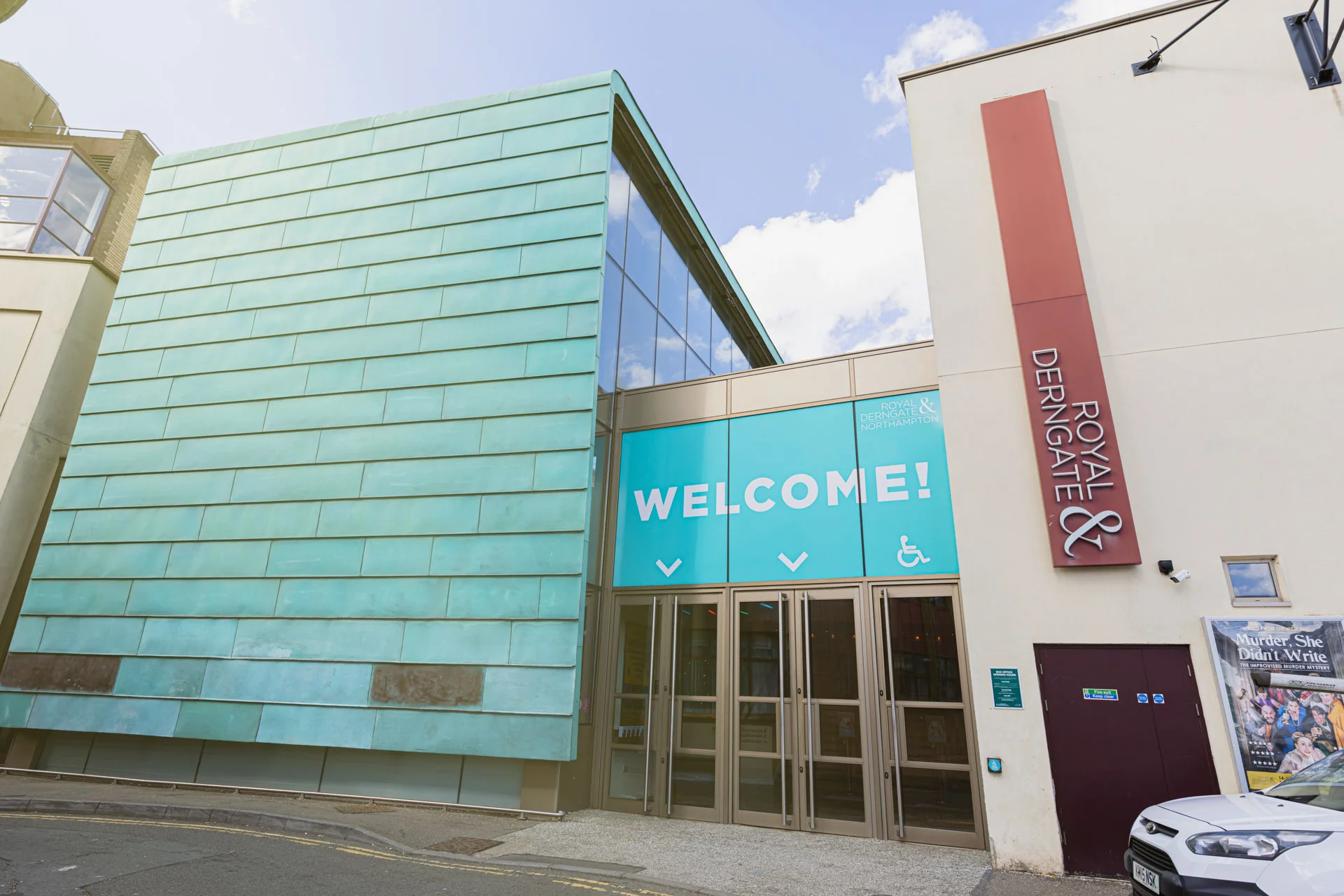 Exterior of Royal and Derngate with large sign saying 'Welcome!'