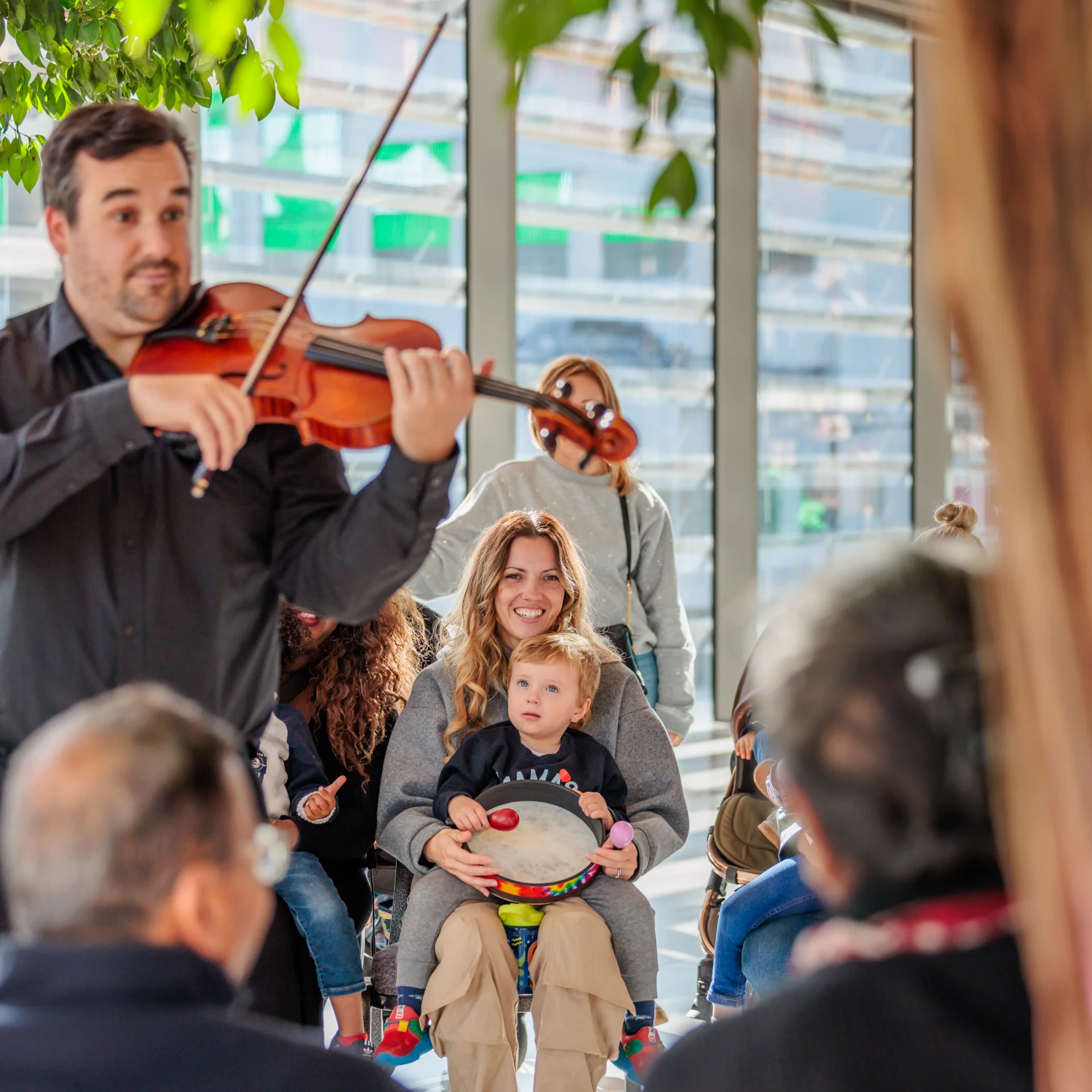 RPO Violinist Joseph Fisher plays for families at The Drum in the Brent Civic Centre as part of our Relaxed Performances