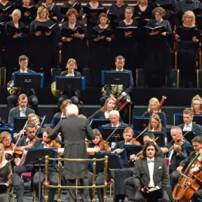 The Royal Philharmonic Orchestra on stage alongside four vocal soloists.