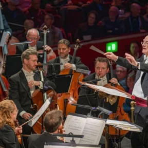 John Rutter conducting