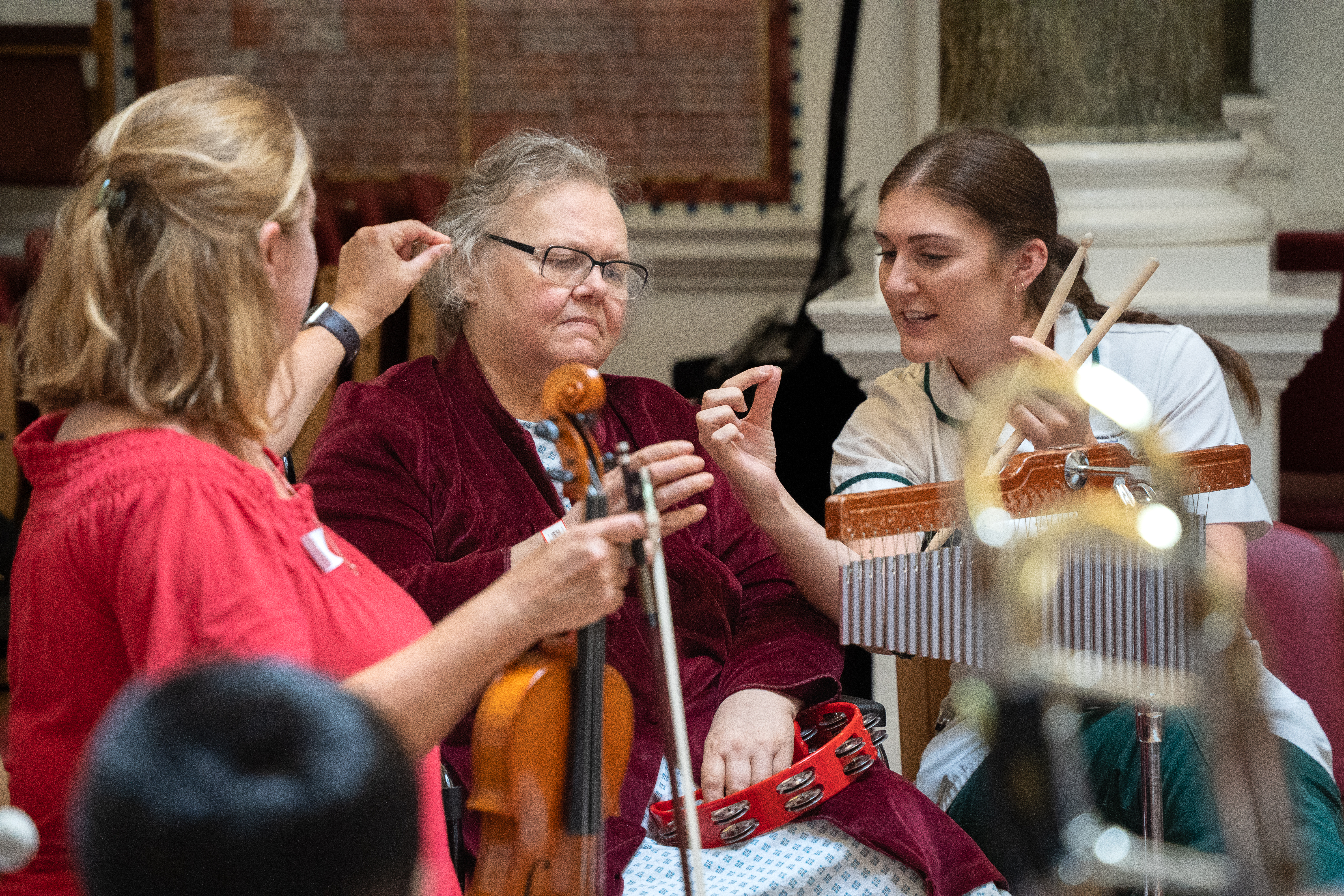 Participant, Clinician and RPO Musician collaborating during the final performance